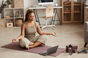 woman doing yoga in her loungeroom